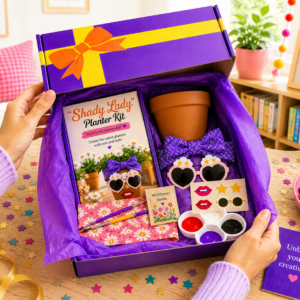 Hands opening purple planter craft kit box